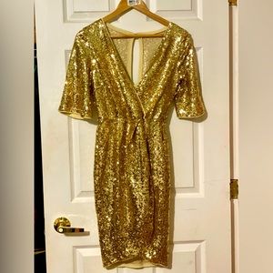 Women’s gold holiday dress.